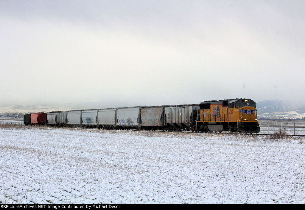 UP SD70M #4367 leads the northbound Cache Valley Local (LCG-41C) approaching the W. 3200 N. Xing in Logan, Utah. April 13, 2022